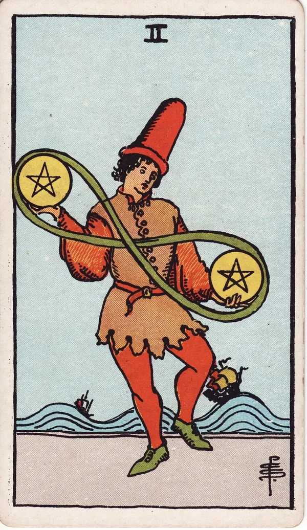 Dos de Oros de la baraja Rider–Waite–Smith